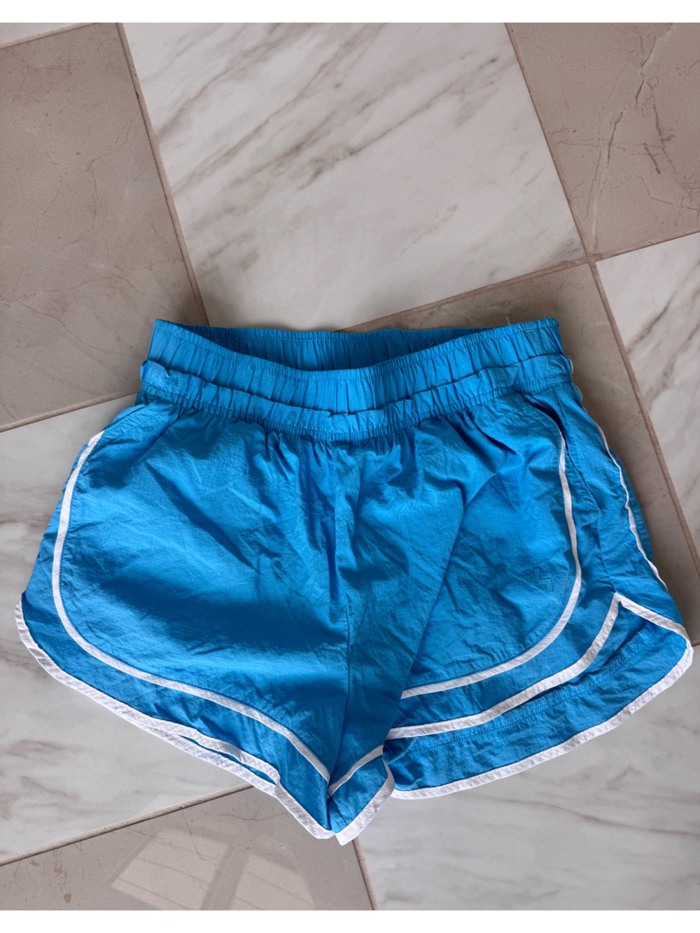 Light blue running shorts